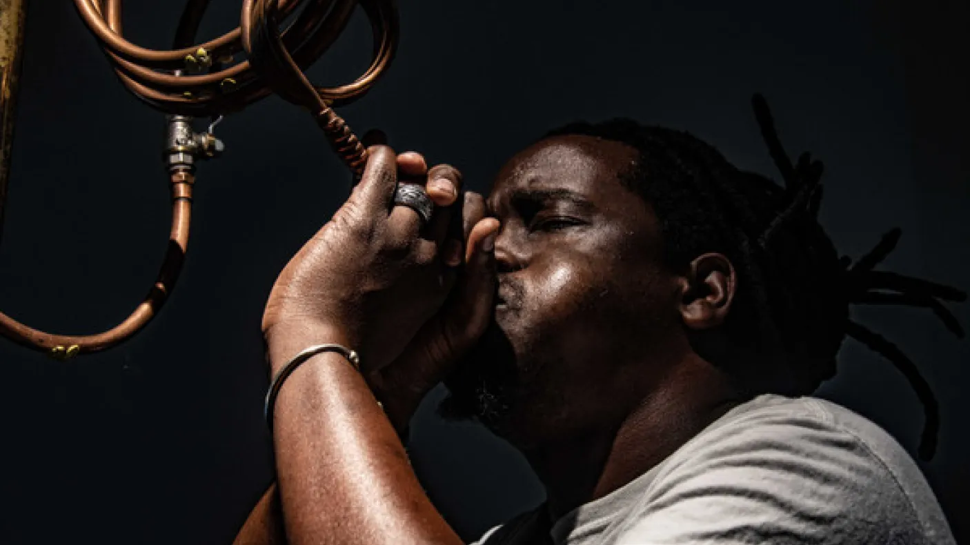 Many playing an instrument. 