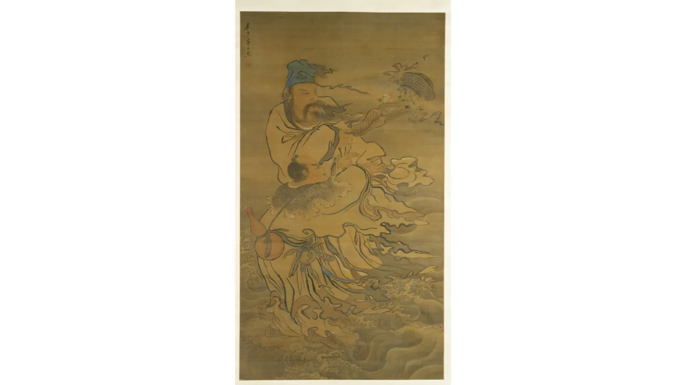 Vertical hanging scroll painting depicting two robed figures amid swirling water and wind. A taller figure stands above, wearing layered robes and a head covering, with long ribbons and sleeves flowing outward. Below, a smaller figure is carried or supported, partially wrapped in the taller figure’s garments. Waves and curving lines fill the lower half of the composition, suggesting movement through water, while fish-like forms and drifting elements appear near the upper right. The artwork is rendered in mu
