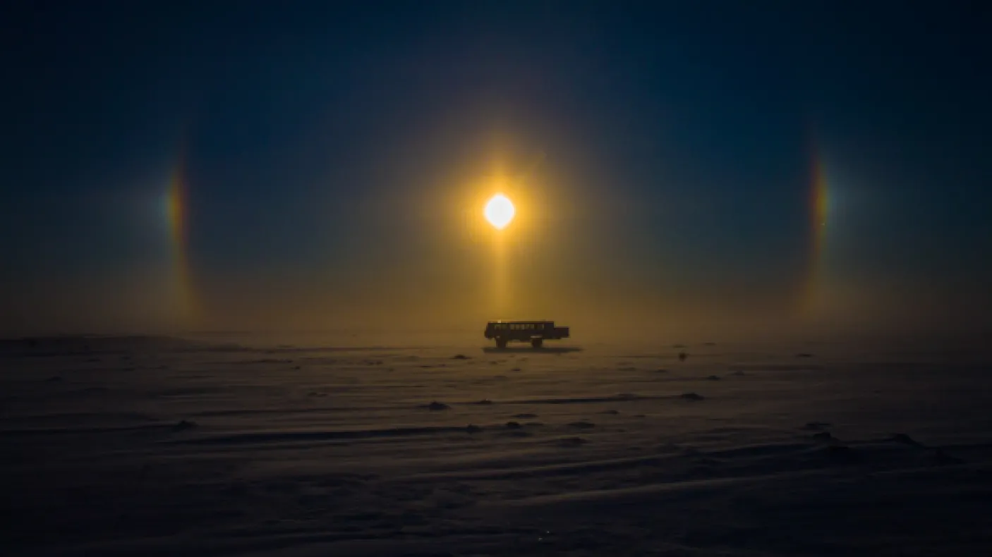 “Tundra Buggy and Sun Dog” Don Gutoski’s snowy view on a photography adventure in Cape Churchill, Manitoba.
