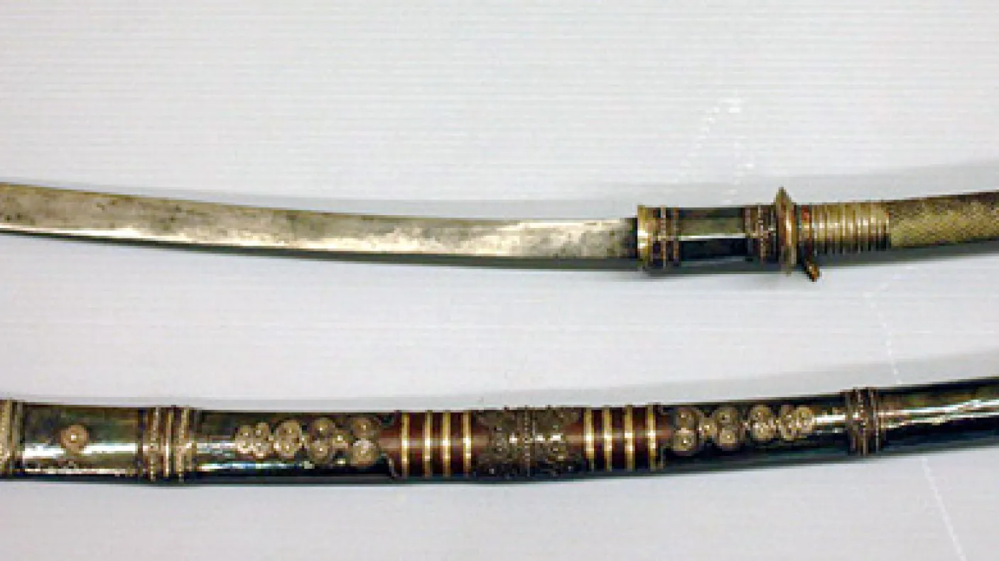 Burmese dha
