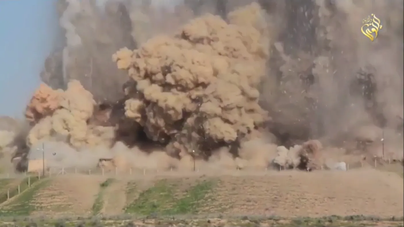 bomb going off in desert.
