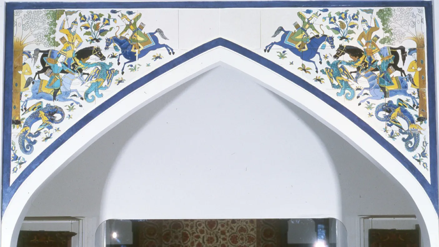 976.298.123 Tiled arch frieze of dragon-slaying scene, made in Isfahan, Iran, Safavid Period 17th century AD; here photographed in the old ROM Islamic gallery
