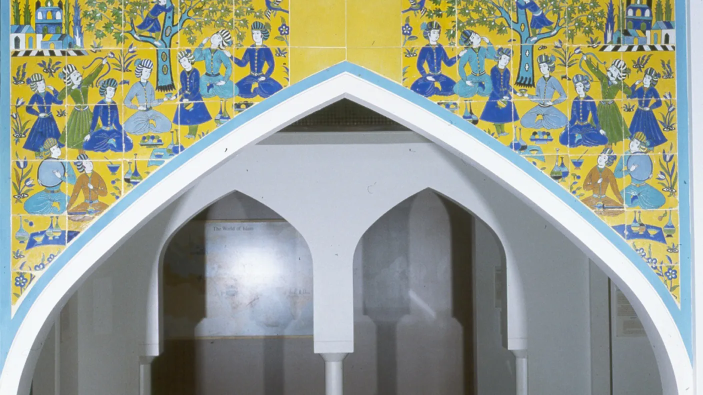 976.298.6-47 one of the ROM's complete Safavid tile friezes, of a picnic scene, photographed here in the old ROM galleries from the 1980's.
