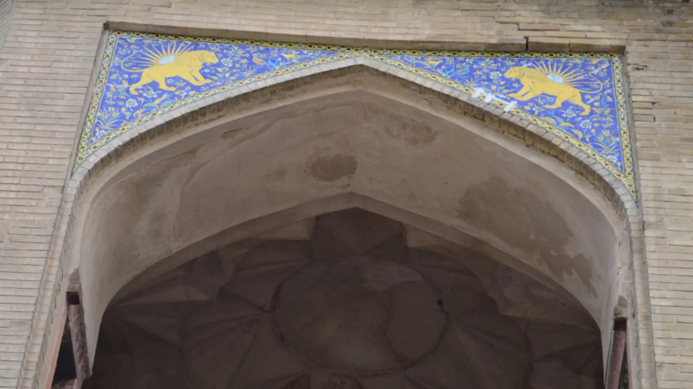 Tiles over an archway.
