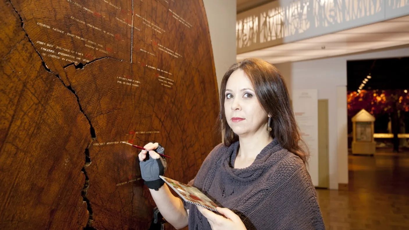 Heidi Sobol conducting conservation work with Tree Cookie
