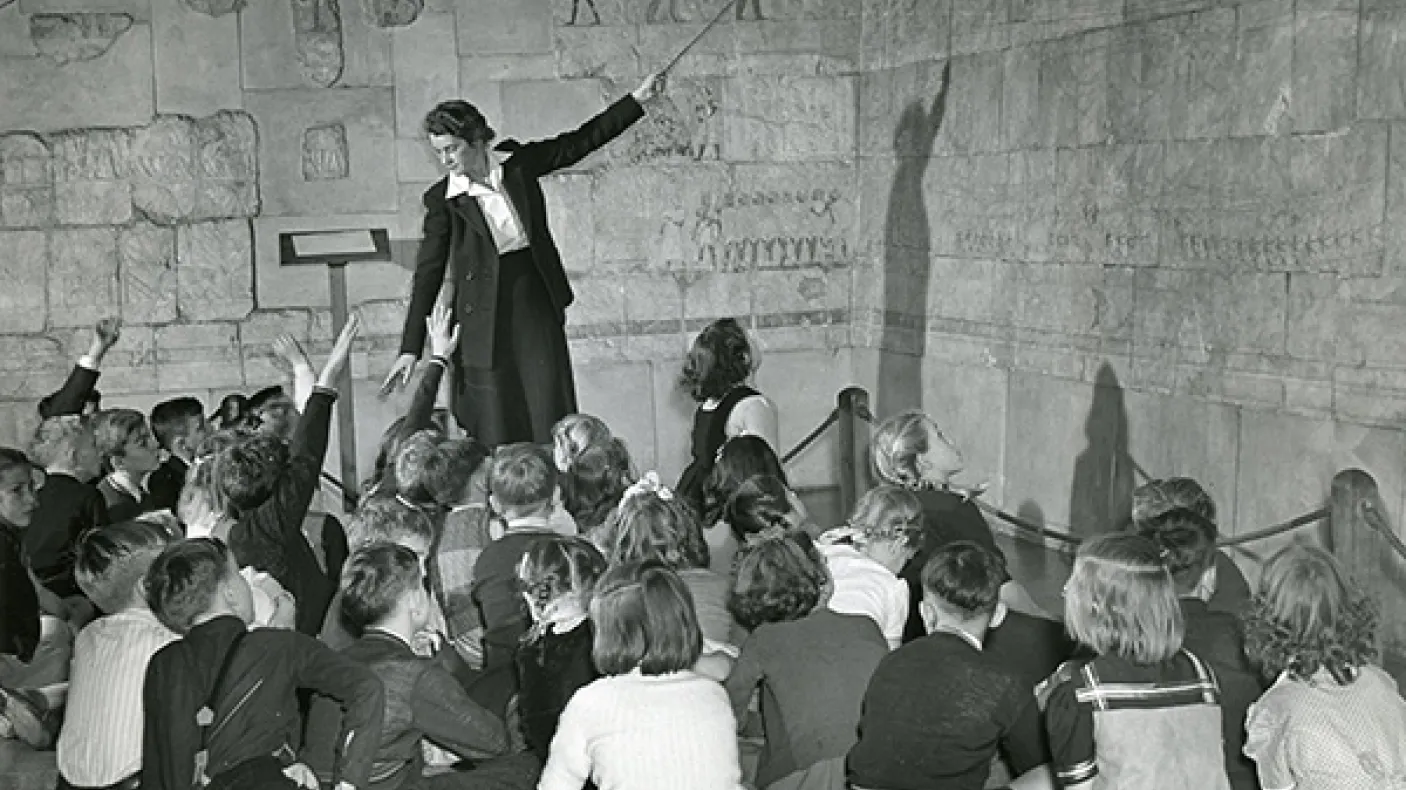 Ella Martin instructs a group of students. ROM Archives SC82
