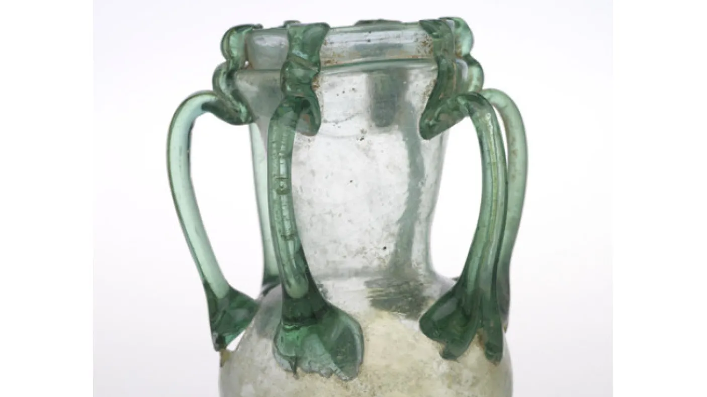 Six-handled green glass jar - Blown glass with trailed handles, Syria - Late Roman - c. 300-425 AD, ROM #909.3.41   - The Walter Massey Collection - Height 12.9cm  Width 9.4cm  Diameter 7.6cm. ROM Photography.
