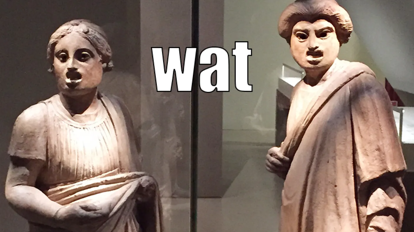Photo: two Pompeian sculptures making silly faces. Caption: Wat.
