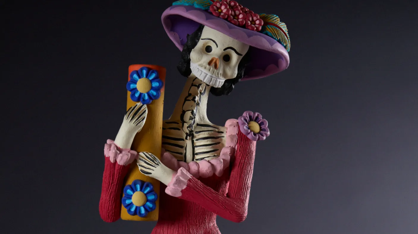 Image Credit: Calaca figurine. Â© Field Museum, Michelle Kuo.
