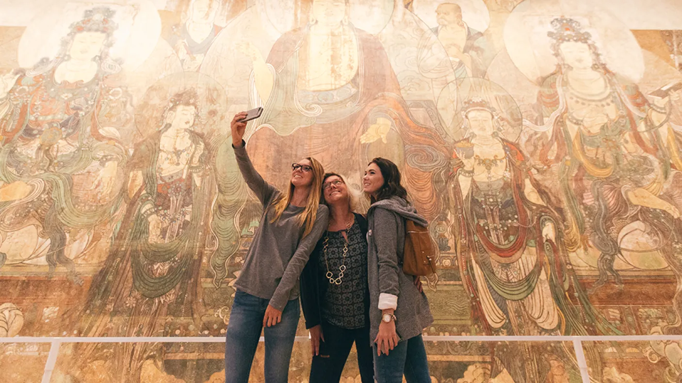 Visitors taking a selfie in the China galleries