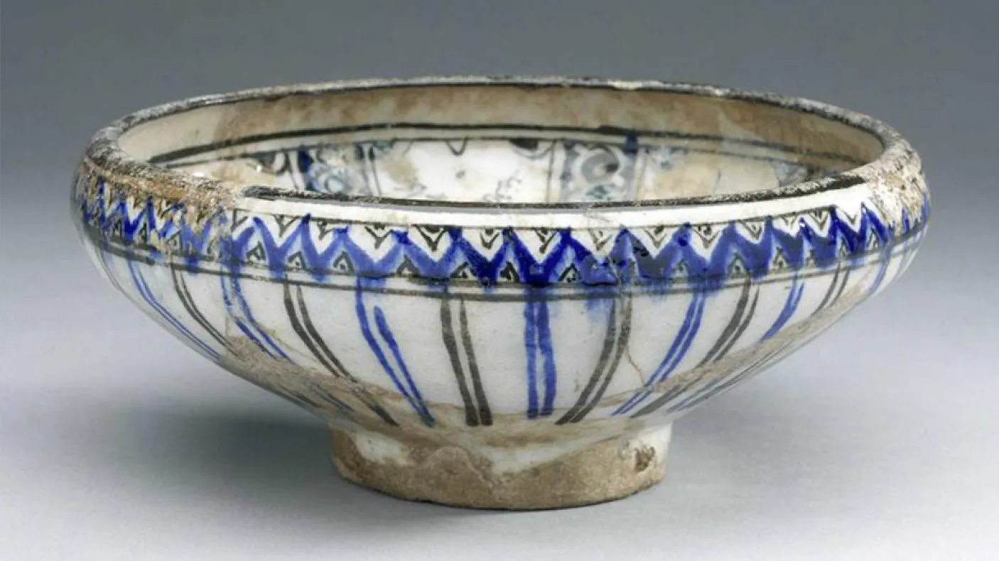 Bowl with geometric interlace pattern.
