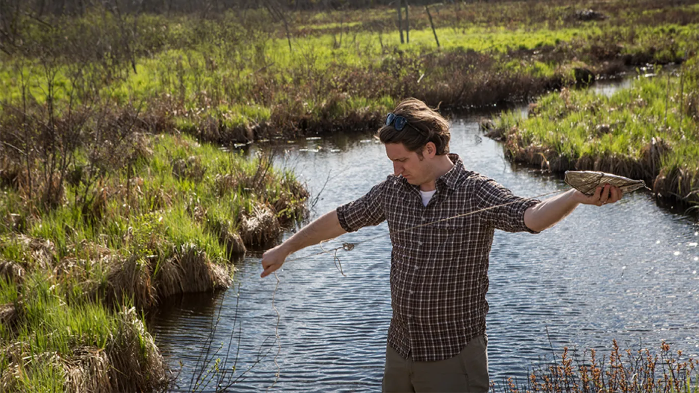 Sebastian Kvist setting a leech trap in Lake Vermilion.
