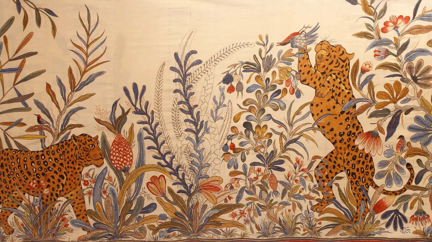 Handspun and handwoven sari with tigers and plants.