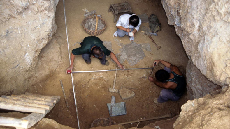 Excavating the Longyadong cave site in 1997.