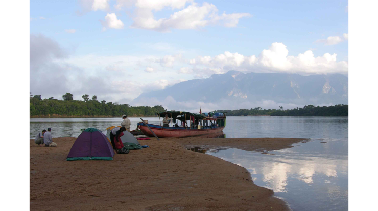 The 2005 Venezuela expedition B-team sets up camp on an upper Orinoco River beach in the shadow of Cerro Duida.