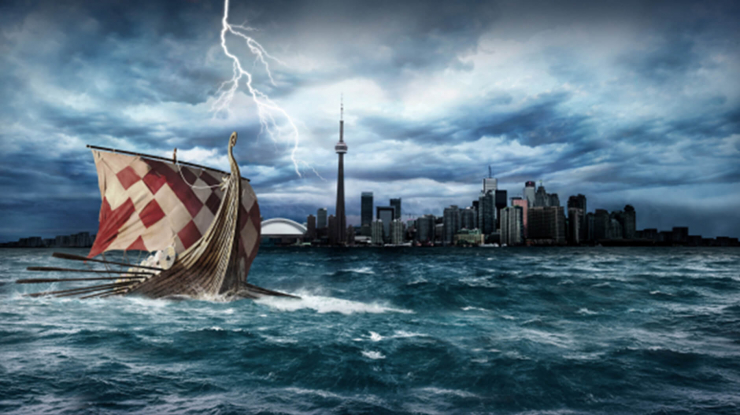 A Viking ship sailing before the Toronto skyline.