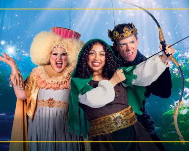 Robin Hood with a bow and arrow with 2 people in frame