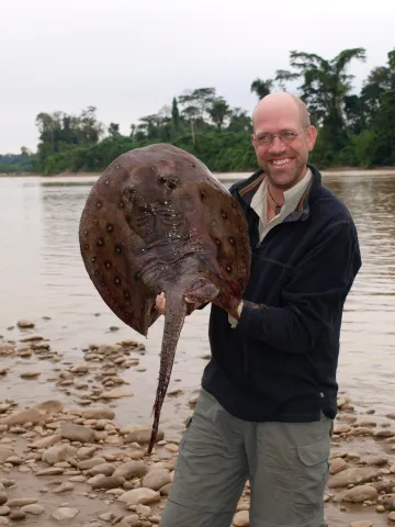 Nathan Lujan with a freshwater ray
