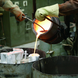 The bronze being poured 