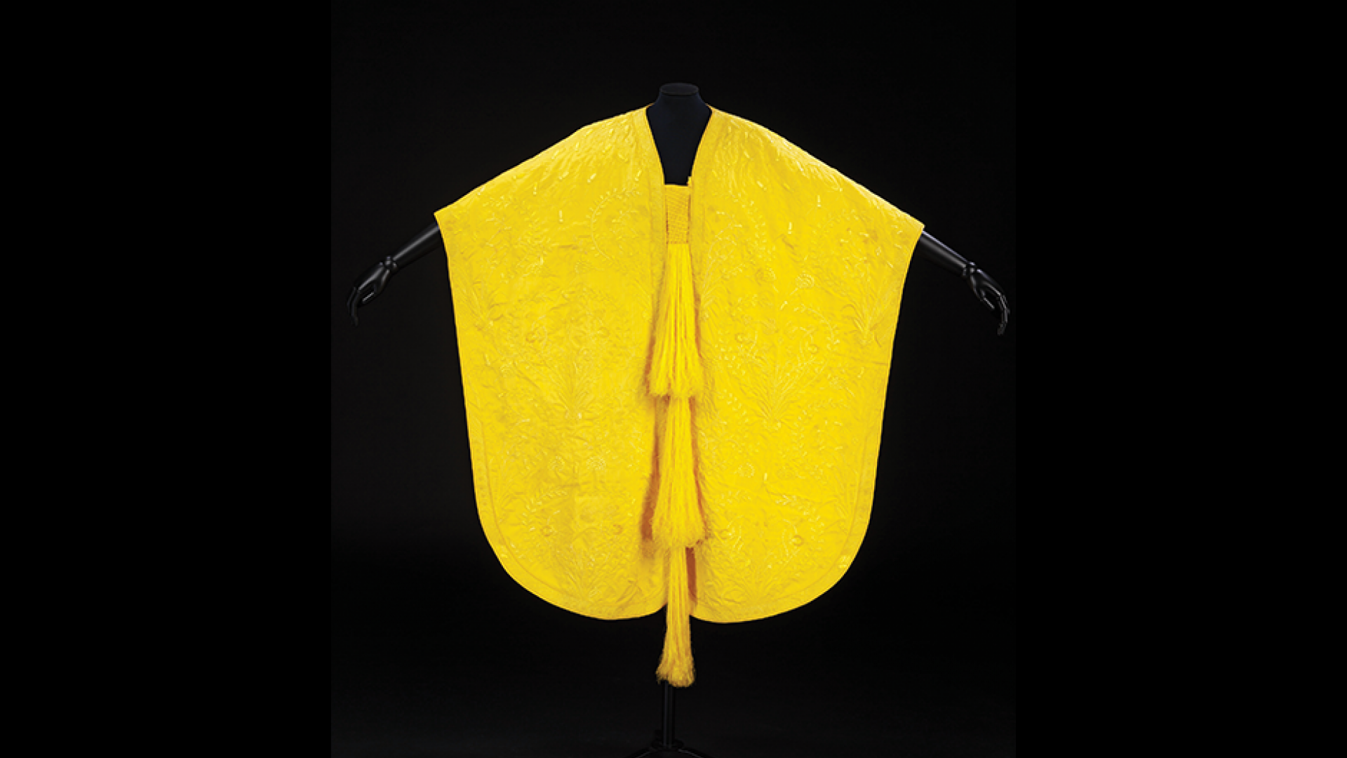 Image of the cape made from golden orb spider silk