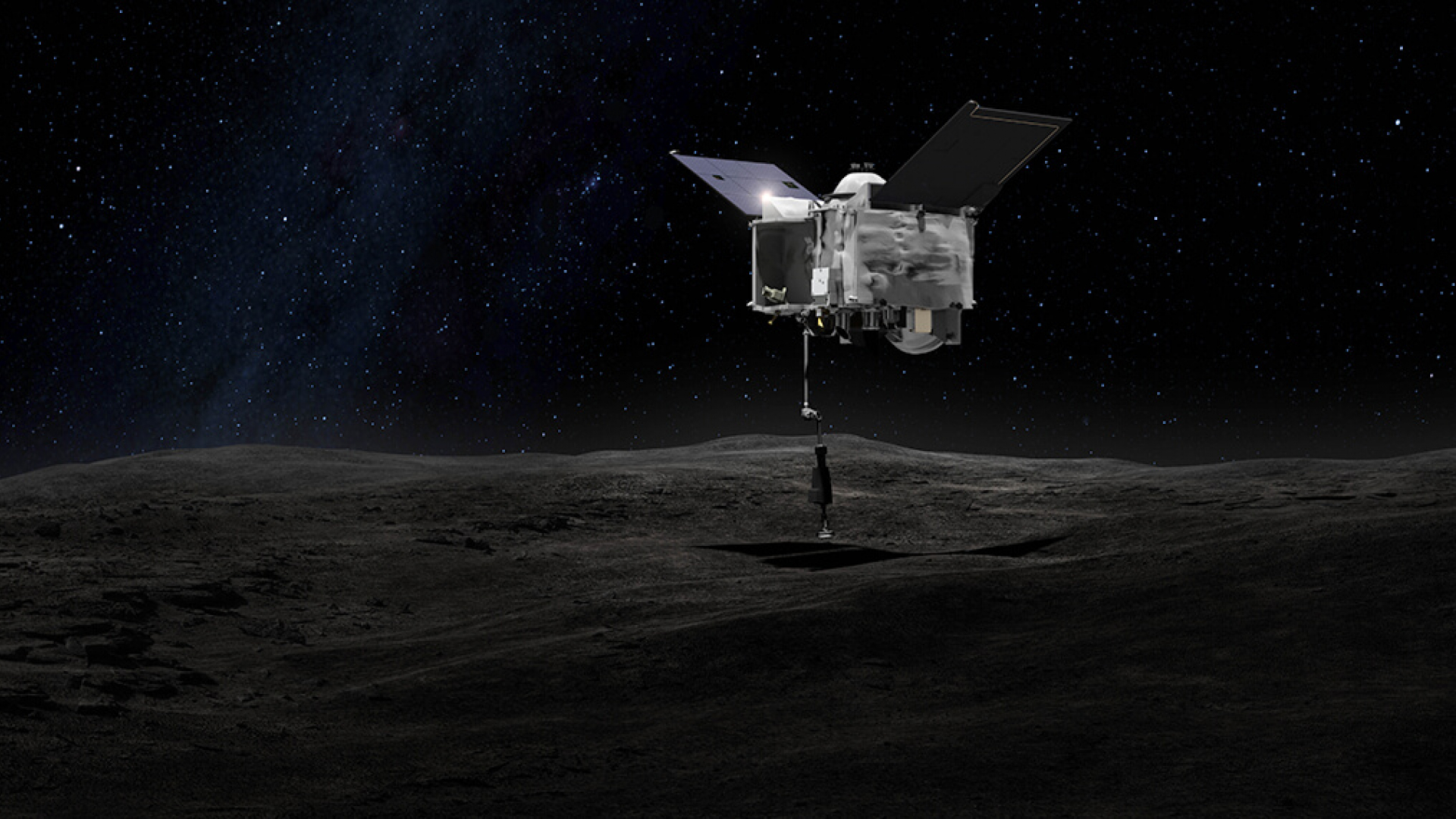 OSIRIS-REx contacts the asteroid Bennu with the Touch-And-Go Sample Arm Mechanism or TAGSAM.