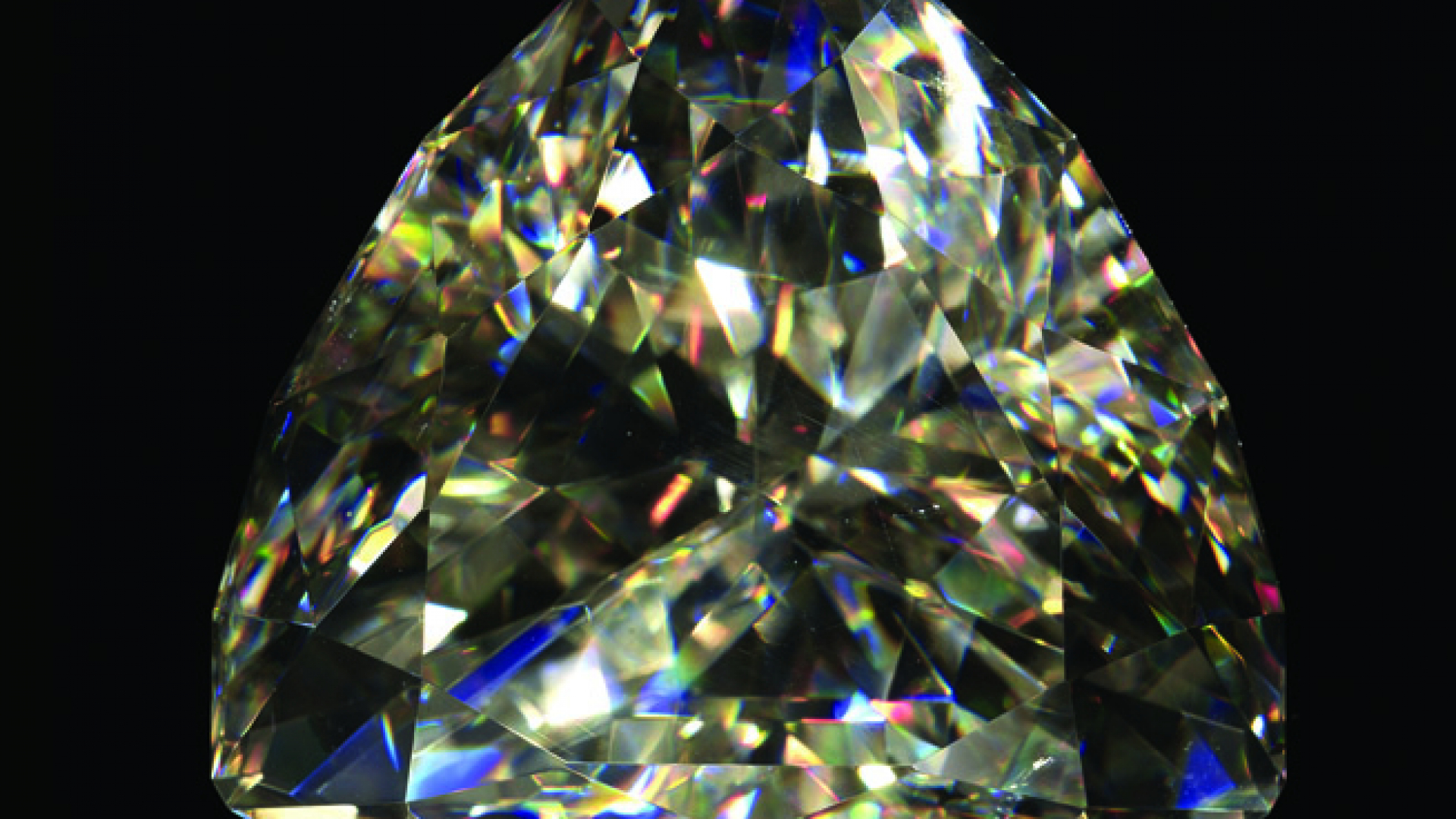 The light of the desert. This remarkable gemstone is the largest faceted cerussite in the world.