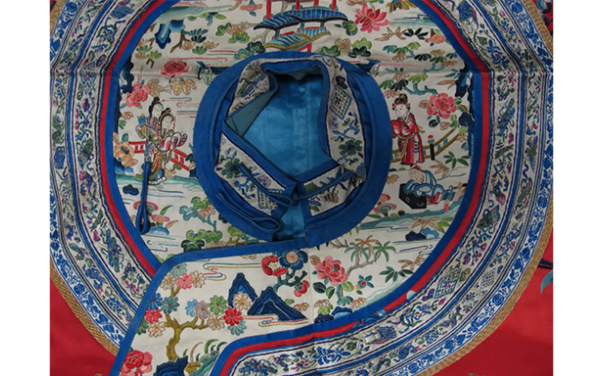 Woman's unofficial formal coat. China. Qing Dynasty last quarter of 19th century. Satin embroidered in silk and gold. 910.65.23. 