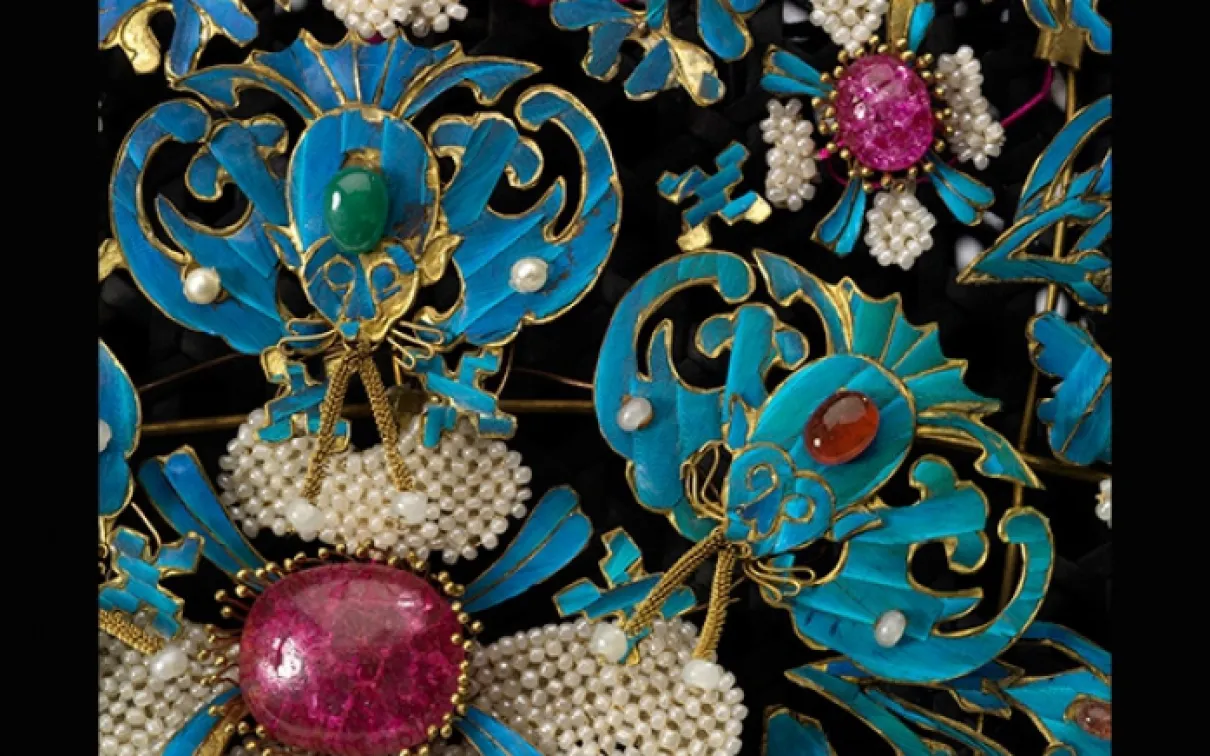 Close up of blue pattern with gold and blue accents