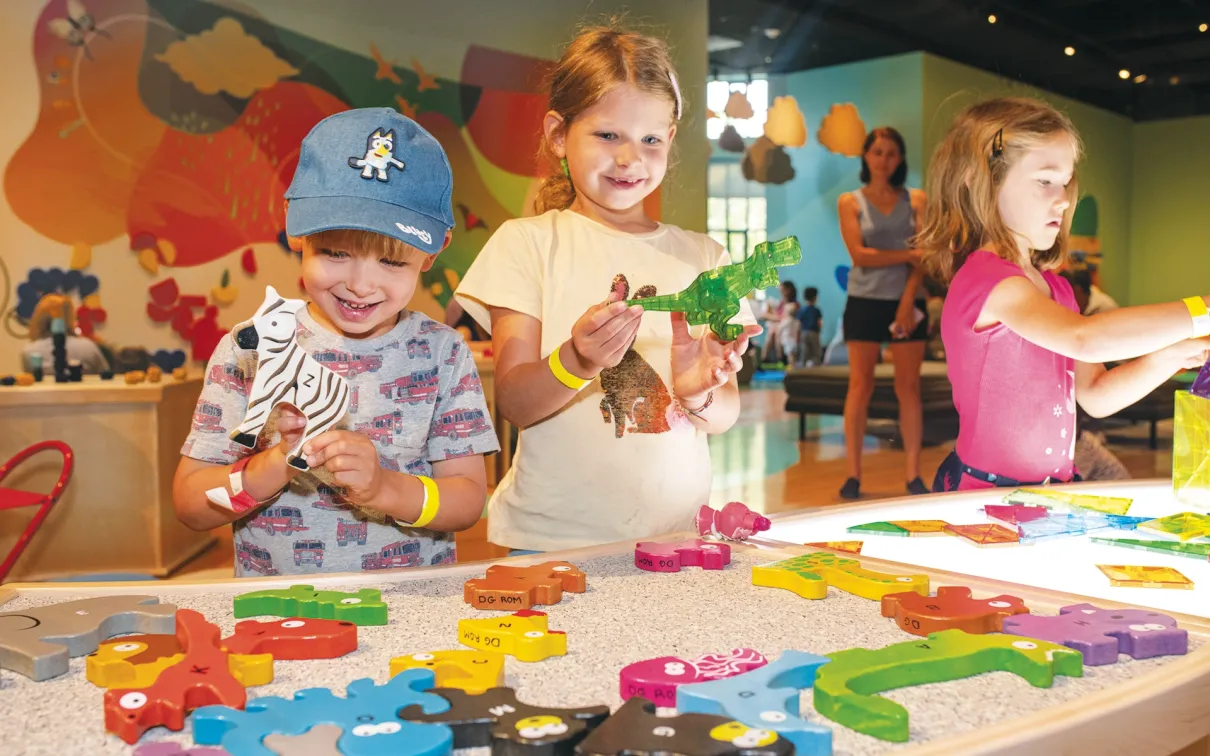 3 children enjoying an activity at ROM Kids PA Day Camp