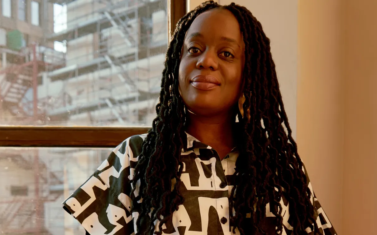 Tandazani Dhlakama standing by a window