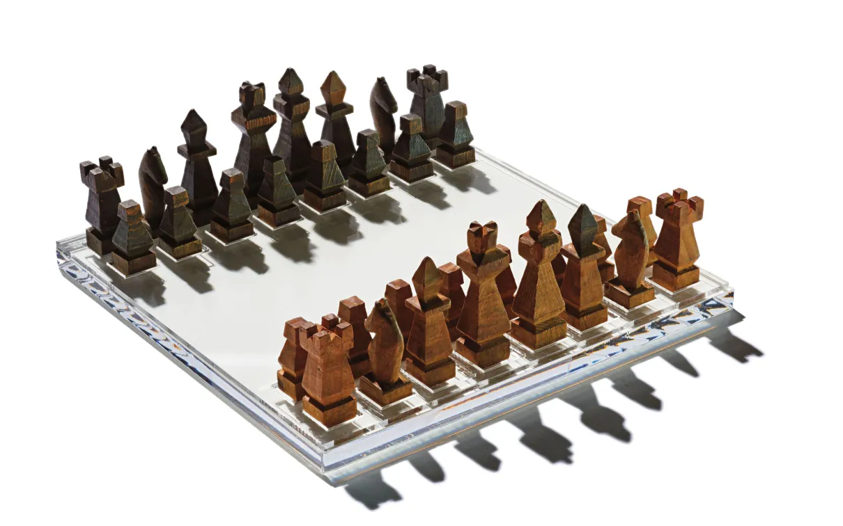Prisoner-made chess set with storage box made out of a sardine tin.