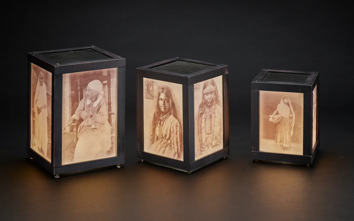 Lanterns illuminating family portraits