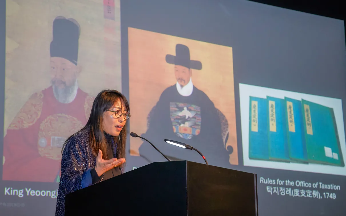 Woman speaking at podium