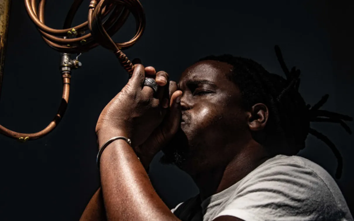 Many playing an instrument. 