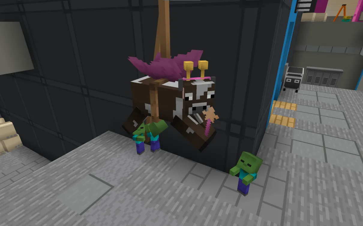 A Minecraft screenshot of several baby zombies struggling to pull a rope to hoist a cow wearing a tutu, wings, and tiara above the stage.