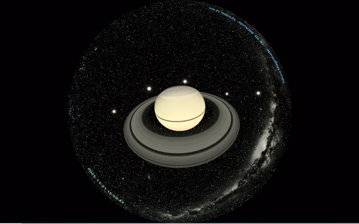 A screenshot of the virtual planetarium showing Saturn’s rings and moons as viewed from space.