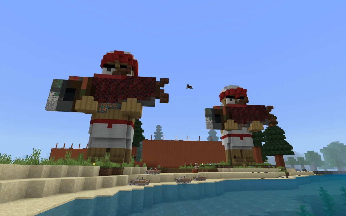 A Minecraft screenshot of two large statues holding salmon on a beach.