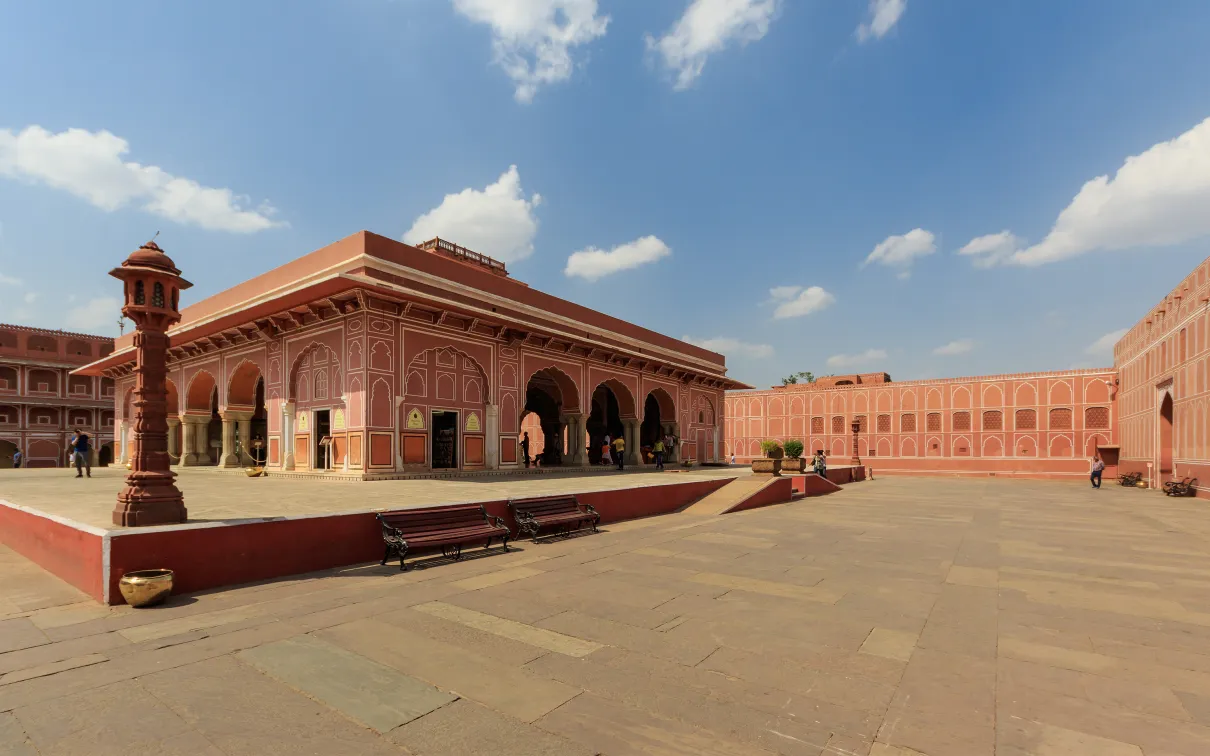A building with arches in a courtyard