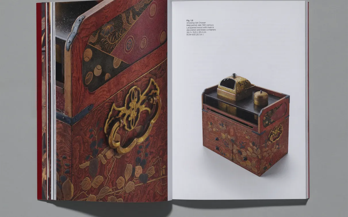 An open book spread with a close-up of a decorated chest on the left page and a full view of an wooden box with drawers on the right page.