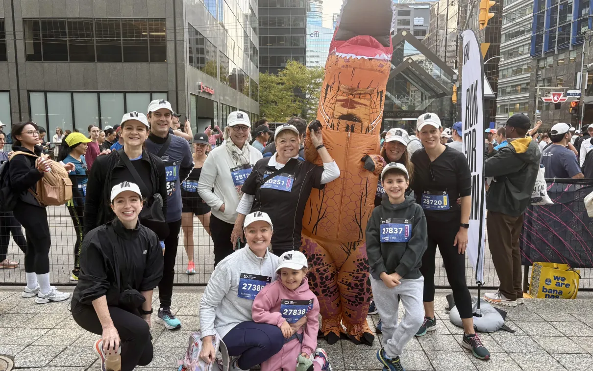 ROM Governors Foundation team in a photo with the Run for ROM mascot. 