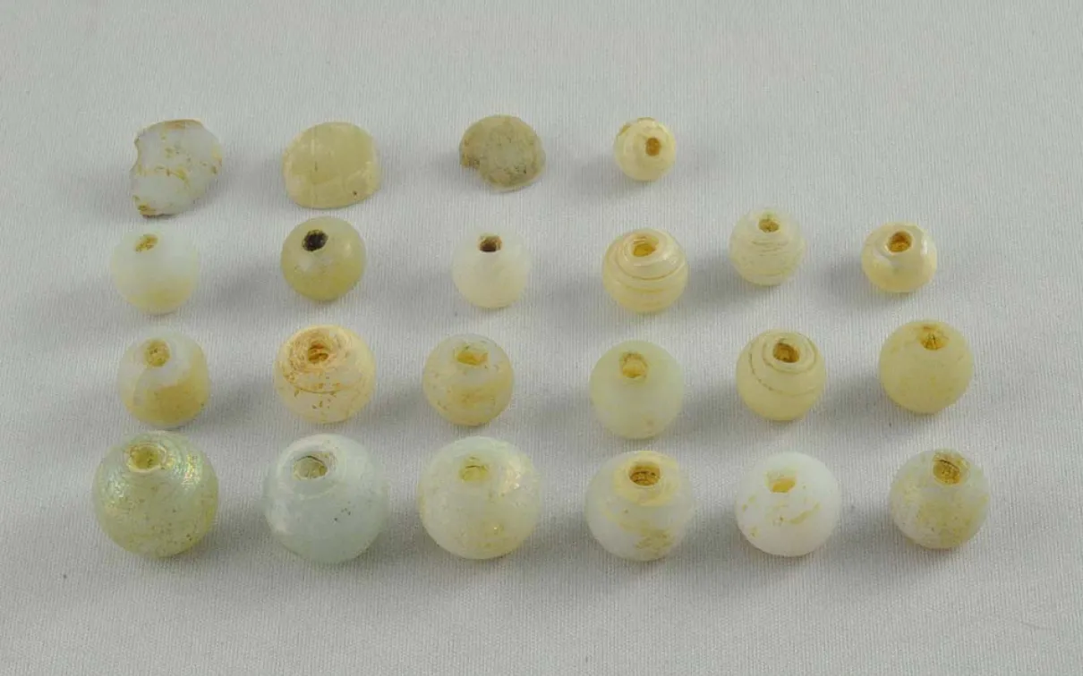 four rows of white sead beads
