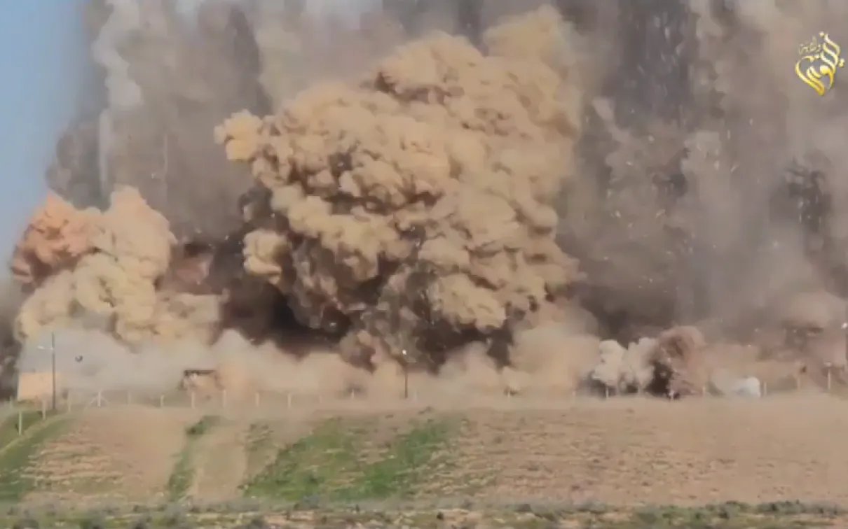 bomb going off in desert.
