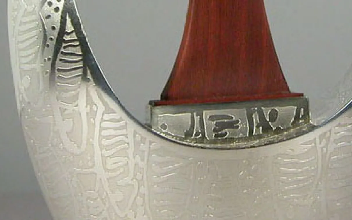 detail of silver teapot
