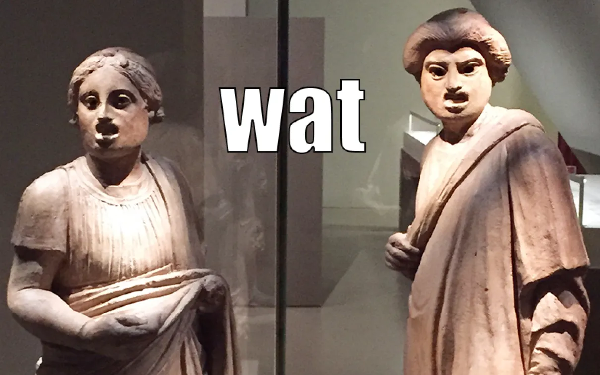 Photo: two Pompeian sculptures making silly faces. Caption: Wat.
