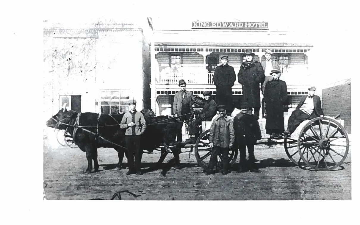 image of workers on a cart
