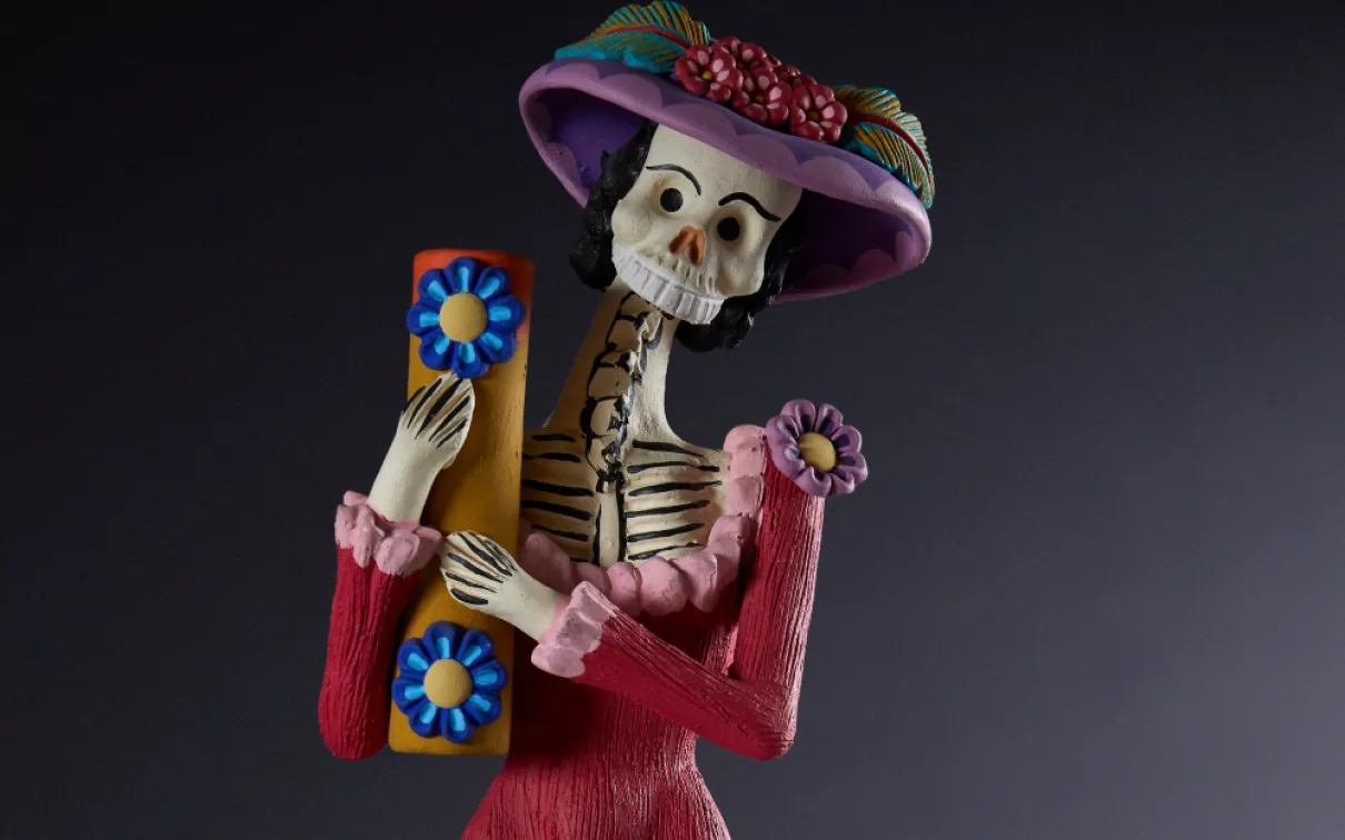 Image Credit: Calaca figurine. Â© Field Museum, Michelle Kuo.
