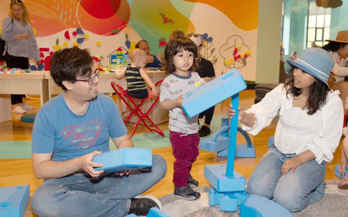 Family enjoying Member preview day at the ROM's WonderWorks Hands-on-Gallery