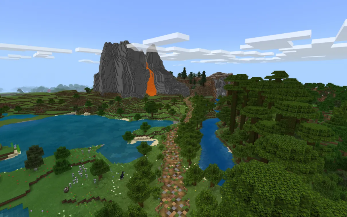 A Minecraft screenshot of a path leading across a rural landscape toward a large volcano with lava pouring down the side.