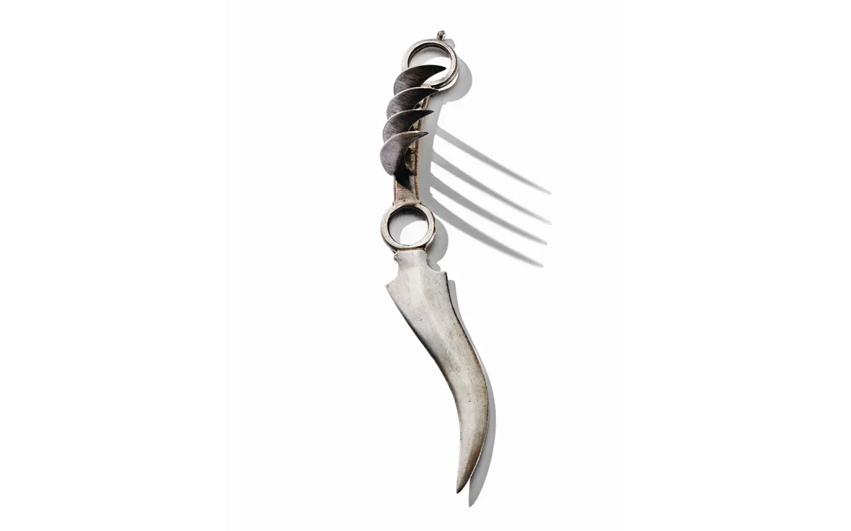 Steel dagger with handle shaped like tiger claws