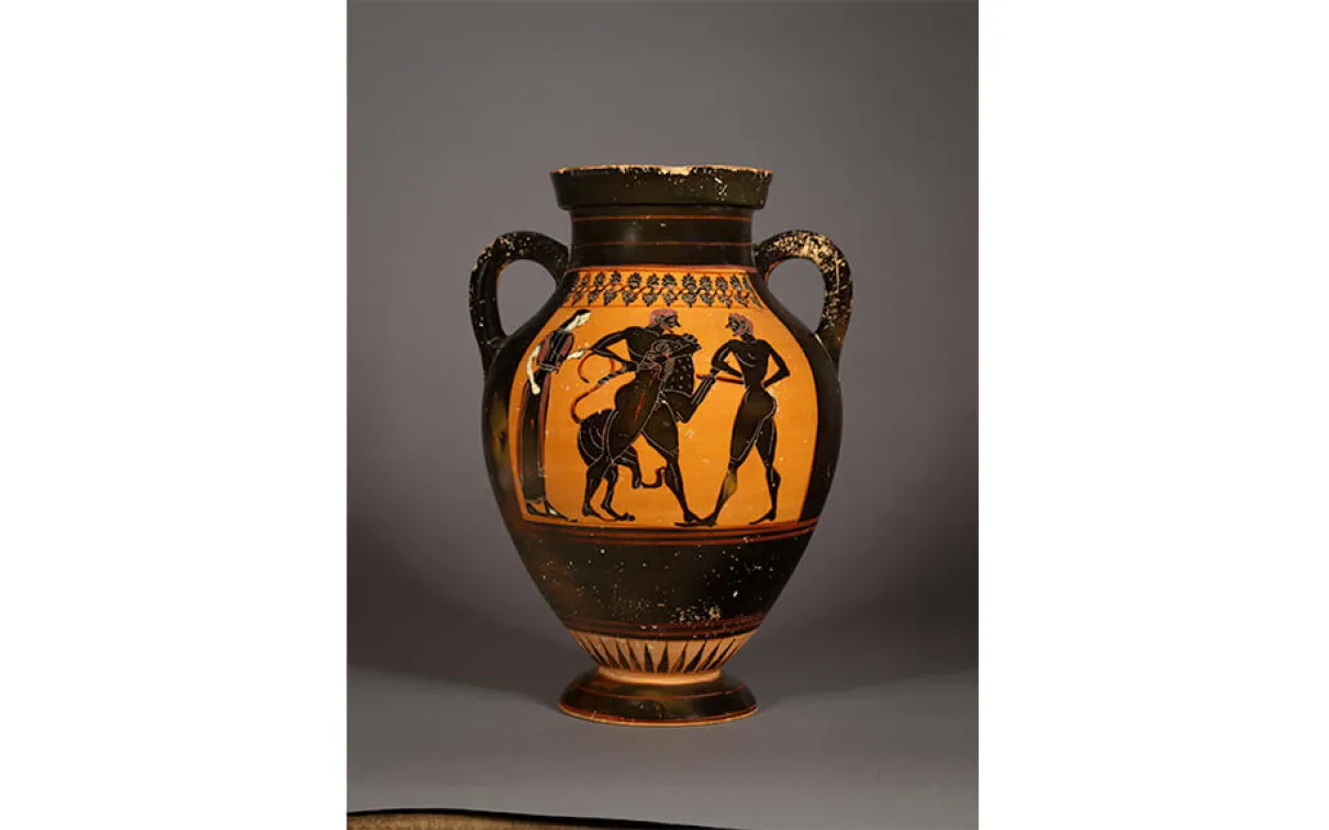 Wheel-thrown earthenware, slip-painted with incised detail.
